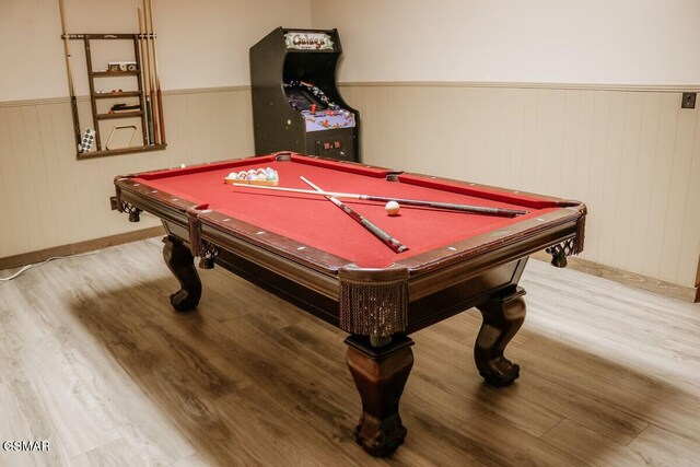 game room featuring a wainscoted wall, billiards, and wood finished floors