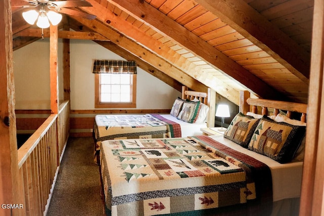 unfurnished bedroom featuring carpet floors, wooden ceiling, vaulted ceiling with beams, and baseboards