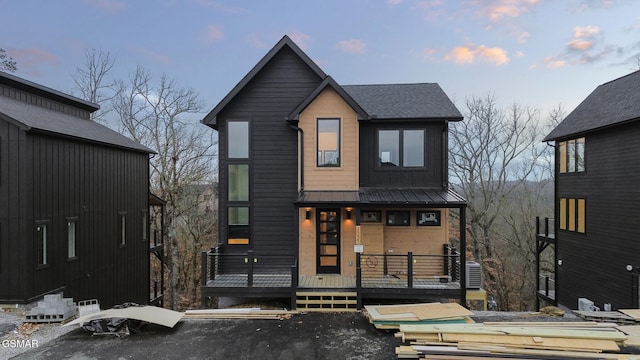 view of front of home with a deck