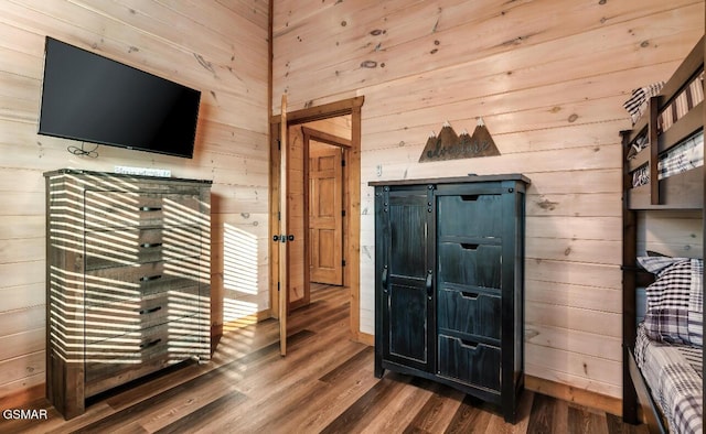 interior space featuring wood walls and wood-type flooring