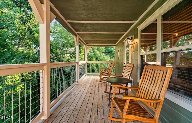 wooden deck featuring a porch