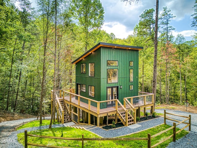 rear view of property with a deck