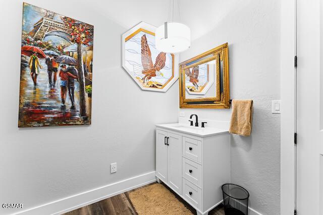 3955 Denton Ct, Sevierville, TN 37862 - bathroom with vanity and wood finished floors