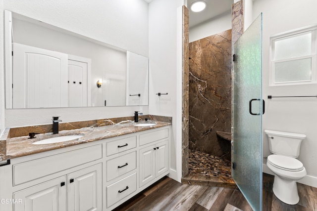 3955 Denton Ct, Sevierville, TN 37862 - full bath with wood finished floors, a marble finish shower, and double vanity