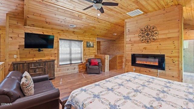 438 Alpine Mountain Way, Pigeon Forge, TN 37863 - bedroom with wood walls, visible vents, wooden ceiling, and vaulted ceiling