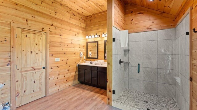 438 Alpine Mountain Way, Pigeon Forge, TN 37863 - bathroom with a shower stall, wooden walls, and wooden ceiling