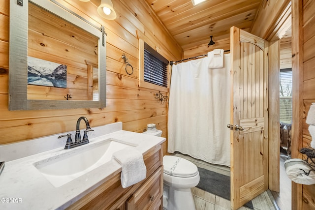 692 Stockton Dr, Sevierville, TN 37876 - full bathroom featuring wood walls, vanity, toilet, a shower with curtain, and wooden ceiling