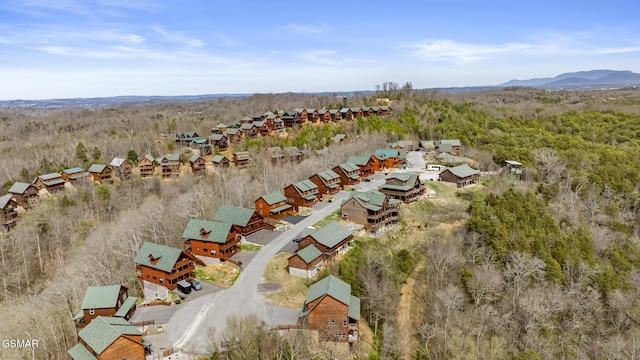 692 Stockton Dr, Sevierville, TN 37876 - aerial perspective of suburban area with a heavily wooded area
