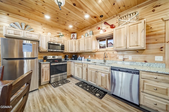 692 Stockton Dr, Sevierville, TN 37876 - kitchen featuring appliances with stainless steel finishes, a sink, light brown cabinets, light wood-type flooring, and wood ceiling