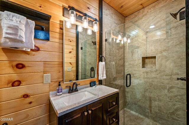 bathroom featuring vanity, an enclosed shower, wood ceiling, and wooden walls