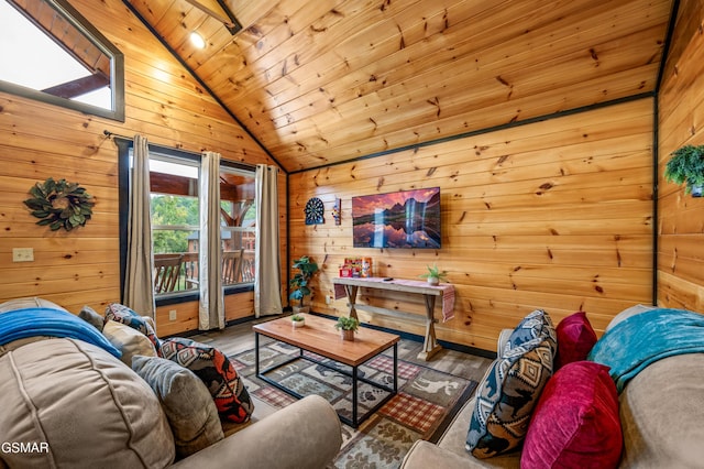 living room featuring lofted ceiling with beams, wooden ceiling, wood walls, and hardwood / wood-style flooring