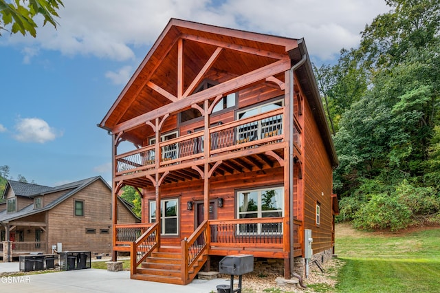 log home with a balcony