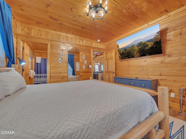 bedroom with wood ceiling, wood finished floors, and wooden walls