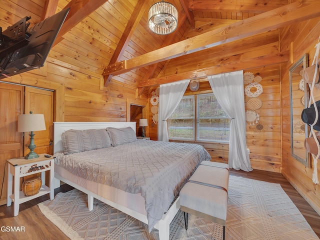 bedroom featuring wood finished floors, wood walls, wood ceiling, and vaulted ceiling with beams