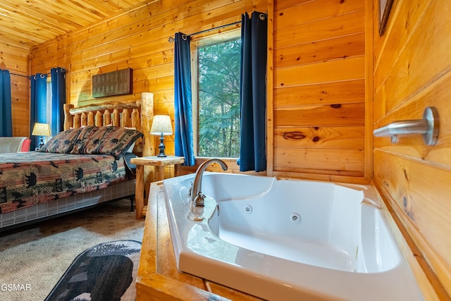 bedroom with carpet flooring, wood walls, and wooden ceiling