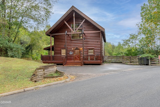 view of log cabin