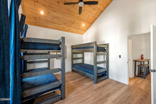 bedroom with wooden ceiling, baseboards, wood finished floors, high vaulted ceiling, and recessed lighting