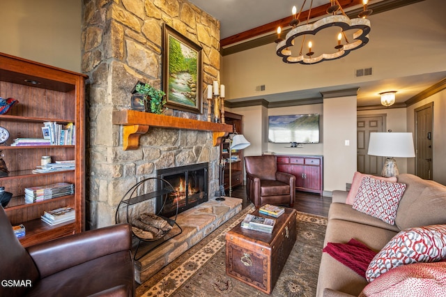 1050 Ski View Dr Unit 306, Gatlinburg, TN 37738 - living area with beam ceiling, wood finished floors, a stone fireplace, and a chandelier