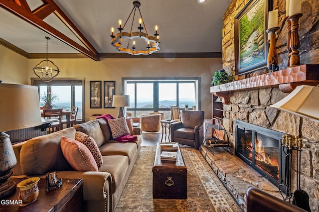 1050 Ski View Dr Unit 306, Gatlinburg, TN 37738 - living area featuring a chandelier, plenty of natural light, a fireplace, crown molding, and wood finished floors