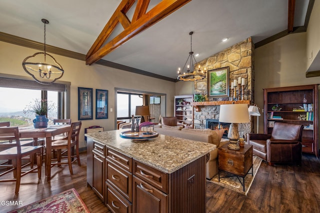 1050 Ski View Dr Unit 306, Gatlinburg, TN 37738 - kitchen featuring a chandelier, dark wood-style flooring, light stone countertops, decorative light fixtures, and beam ceiling
