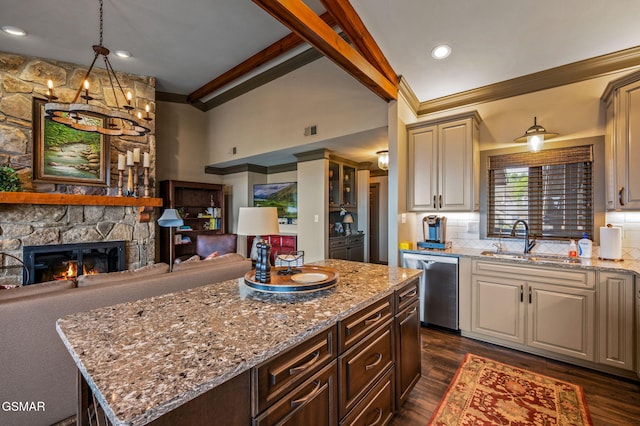 1050 Ski View Dr Unit 306, Gatlinburg, TN 37738 - kitchen with a sink, dishwasher, ornamental molding, light stone counters, and open floor plan
