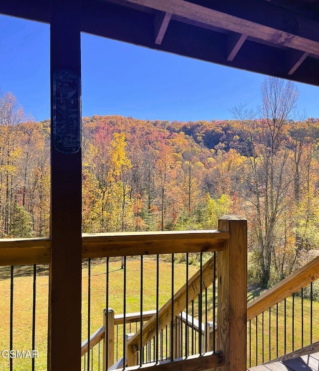 wooden deck with a yard