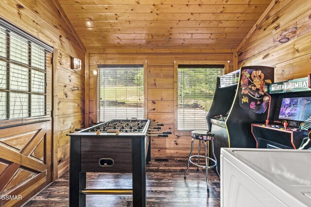 rec room featuring wooden walls, dark hardwood / wood-style flooring, lofted ceiling, and wood ceiling