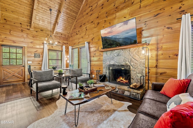 living room featuring a fireplace, wood ceiling, high vaulted ceiling, beamed ceiling, and hardwood / wood-style floors