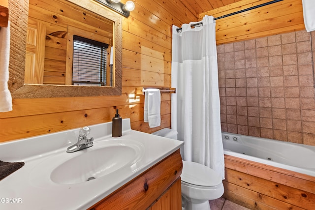 full bathroom with wood walls, toilet, vanity, and shower / bath combo with shower curtain