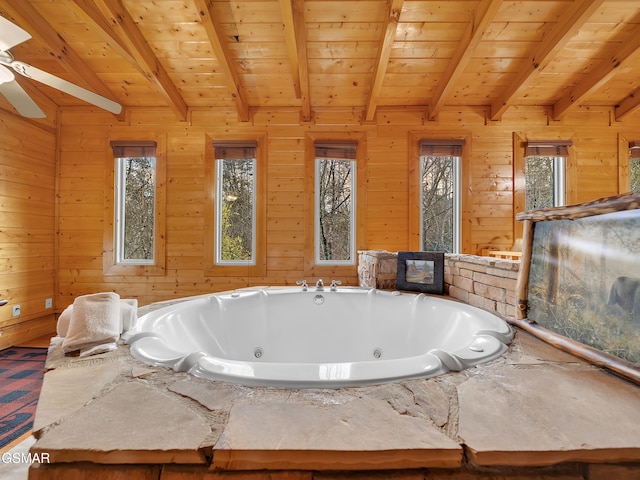3416 Merlin Way, Pigeon Forge, TN 37863 - full bathroom featuring plenty of natural light, a tub with jets, a wood ceiling with exposed beams, wooden walls, and a ceiling fan