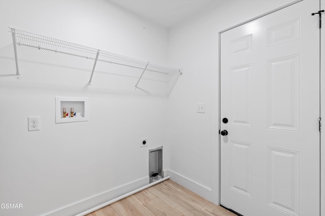 laundry room with hookup for an electric dryer, washer hookup, and light hardwood / wood-style floors