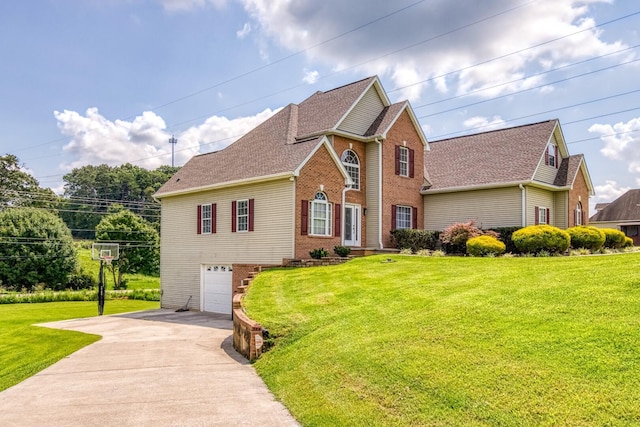 front of property featuring a front yard and a garage