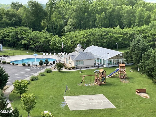 drone / aerial view of a pool area