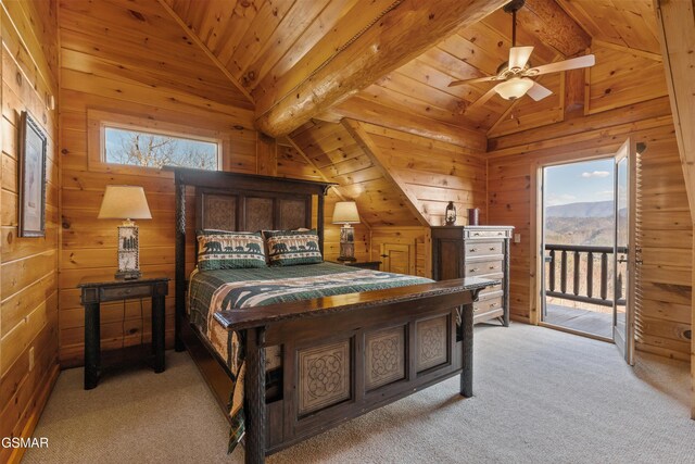 2436 Smoky Vista Way, Sevierville, TN 37862 - bedroom with access to outside, multiple windows, wooden walls, wood ceiling, and light carpet