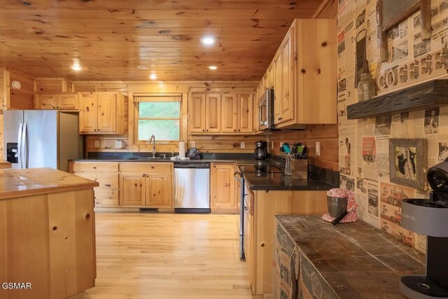 2336 Breezy Rd, Sevierville, TN 37876 - kitchen featuring appliances with stainless steel finishes, wood ceiling, dark countertops, light wood finished floors, and light brown cabinetry