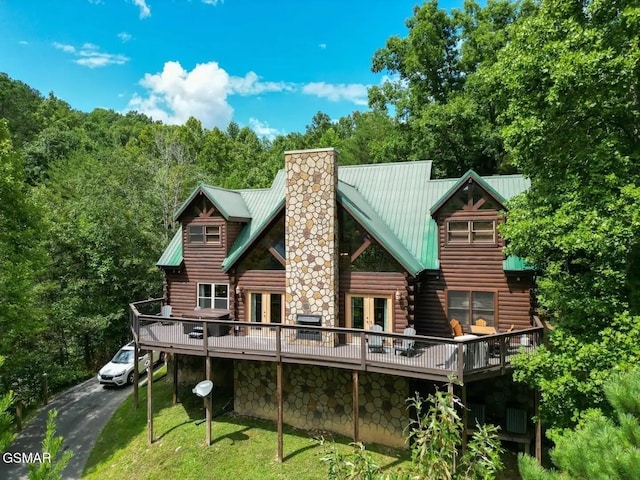 2336 Breezy Rd, Sevierville, TN 37876 - rear view of house with french doors, log exterior, a deck, and a chimney