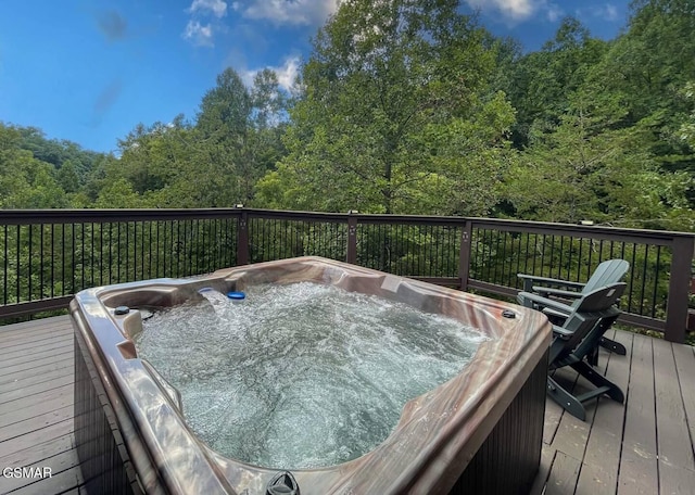 2336 Breezy Rd, Sevierville, TN 37876 - wooden deck featuring a forest view and a hot tub