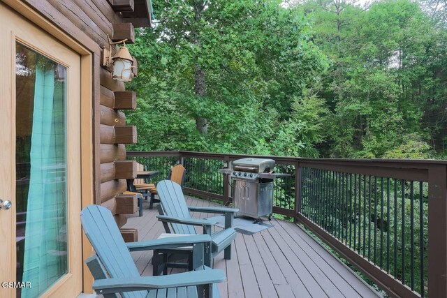 2336 Breezy Rd, Sevierville, TN 37876 - deck featuring a grill and a view of trees