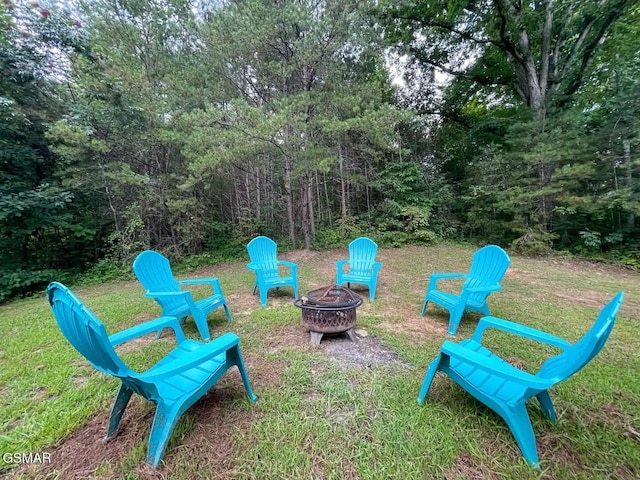 2336 Breezy Rd, Sevierville, TN 37876 - view of green lawn featuring an outdoor fire pit