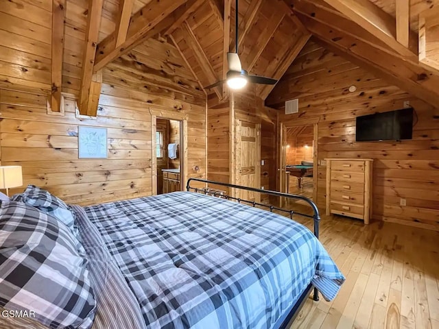 2336 Breezy Rd, Sevierville, TN 37876 - bedroom featuring wood walls, wooden ceiling, and hardwood / wood-style floors