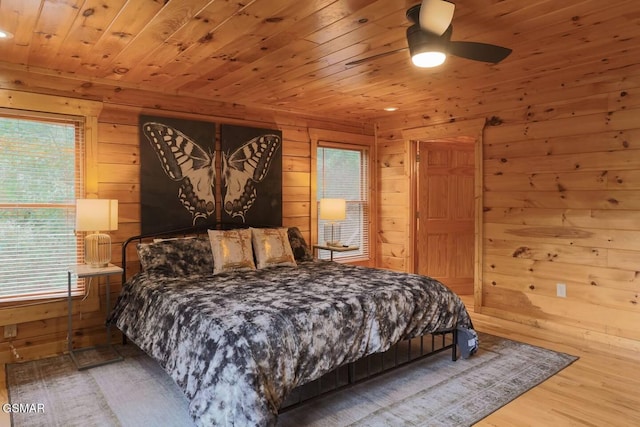 2336 Breezy Rd, Sevierville, TN 37876 - bedroom featuring wooden walls, light wood-type flooring, wooden ceiling, recessed lighting, and ceiling fan