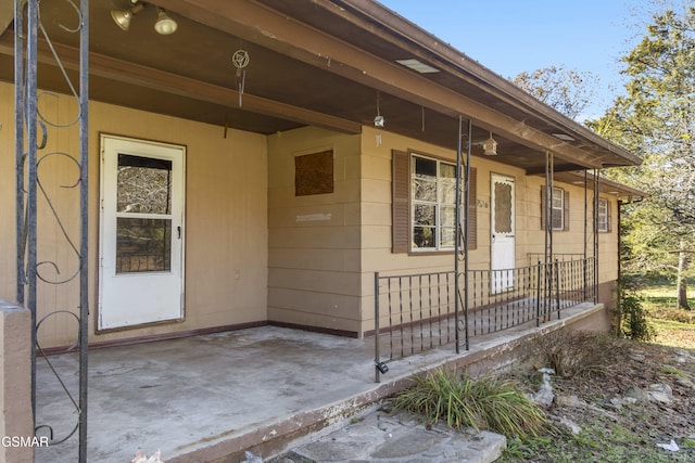 entrance to property with covered porch