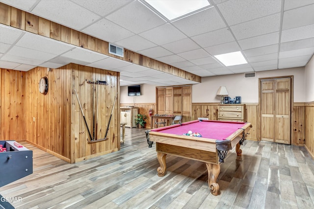 game room featuring wood finished floors, visible vents, a paneled ceiling, pool table, and wainscoting