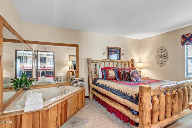 bedroom featuring carpet