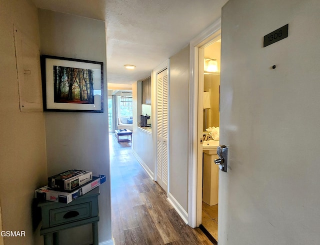 hallway featuring hardwood / wood-style floors