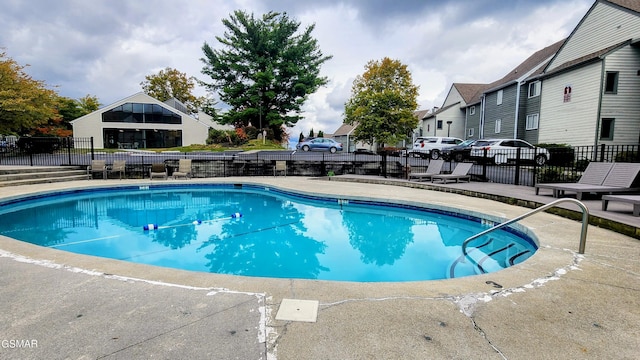 view of pool featuring a patio area