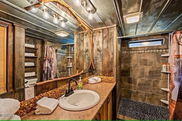 bathroom with vanity and walk in shower