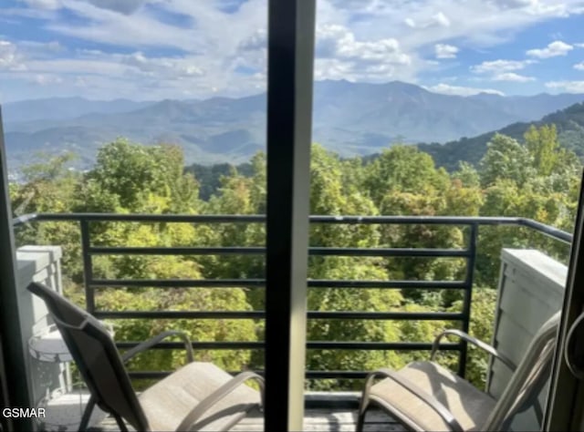 balcony featuring a mountain view