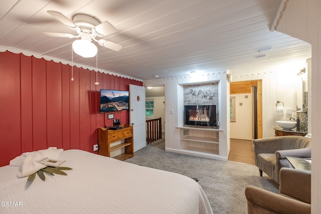 204 Hill St, Gatlinburg, TN 37738 - bedroom with carpet floors and a glass covered fireplace