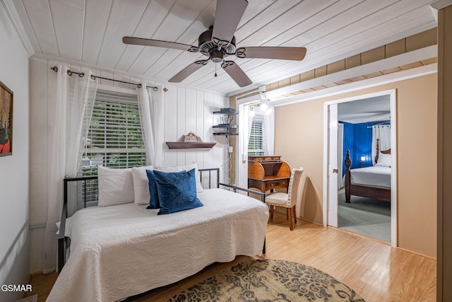 204 Hill St, Gatlinburg, TN 37738 - bedroom with wood finished floors, ceiling fan, and wooden ceiling